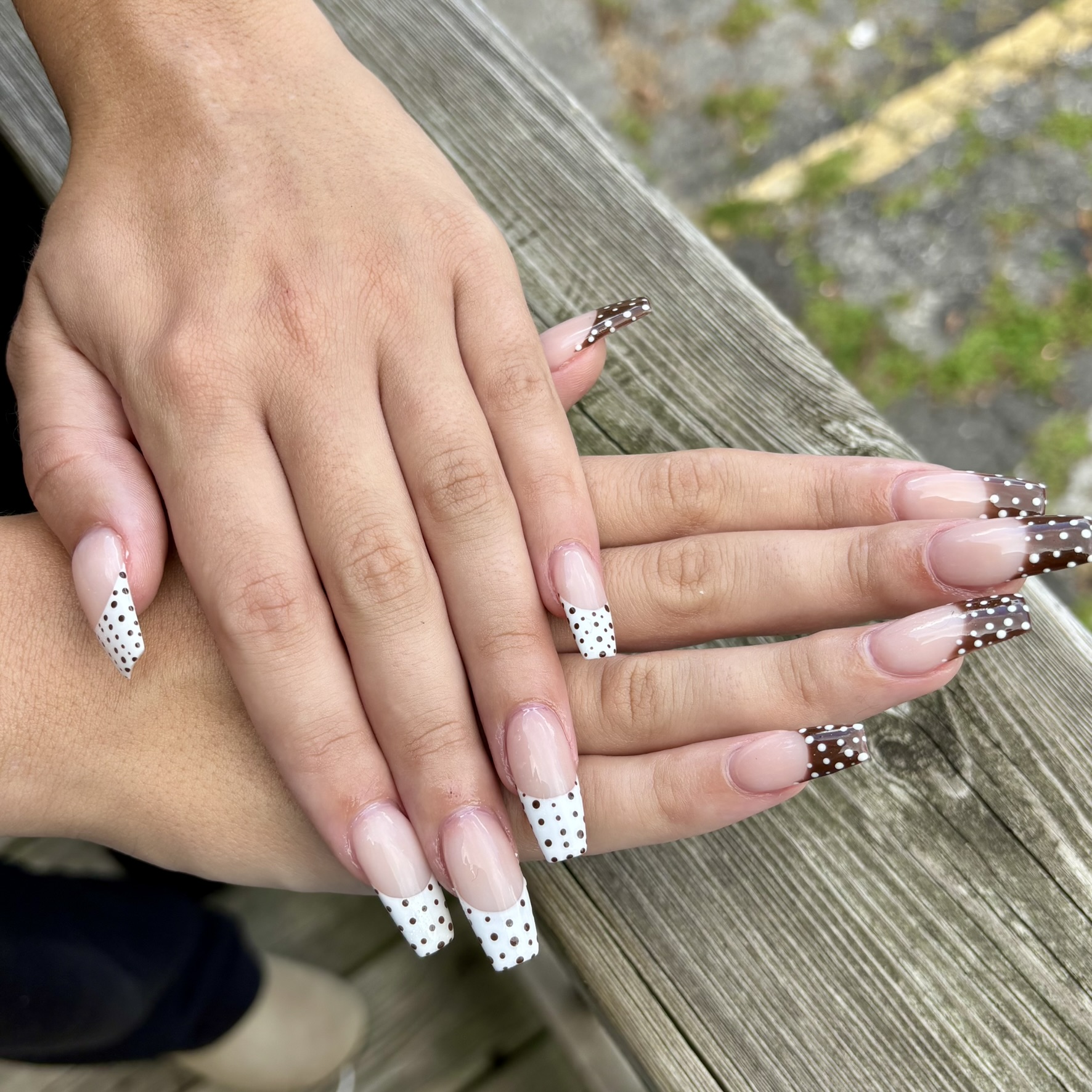 Coffin shape polka dot French tip nails by TwentyOne Nails and Spa London
