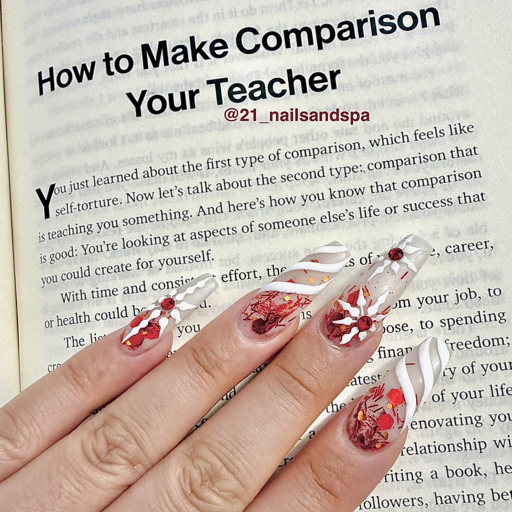 Long coffin nails with red glitter and white snowflake holiday art London Ontario