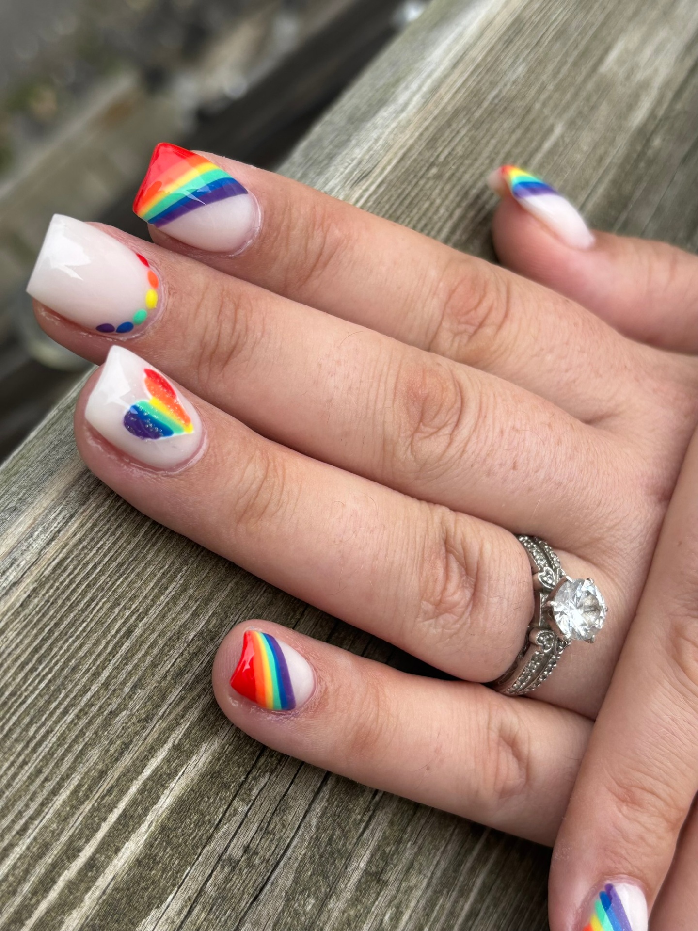 Rainbow pride French tip nails with heart accent London Ontario