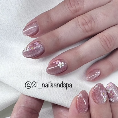 Mauve shimmer gel nails with delicate white flower art by TwentyOne Nails and Spa